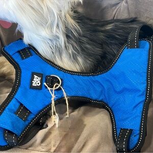 Blue Dog Harness.  S/m adjustable.  Squeeze closure buckle.  NWOT